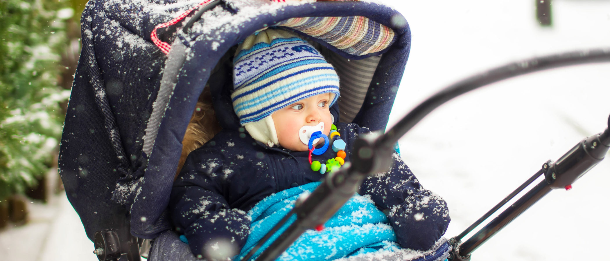 Cómo llevar vestido y tapado a un bebé en invierno
